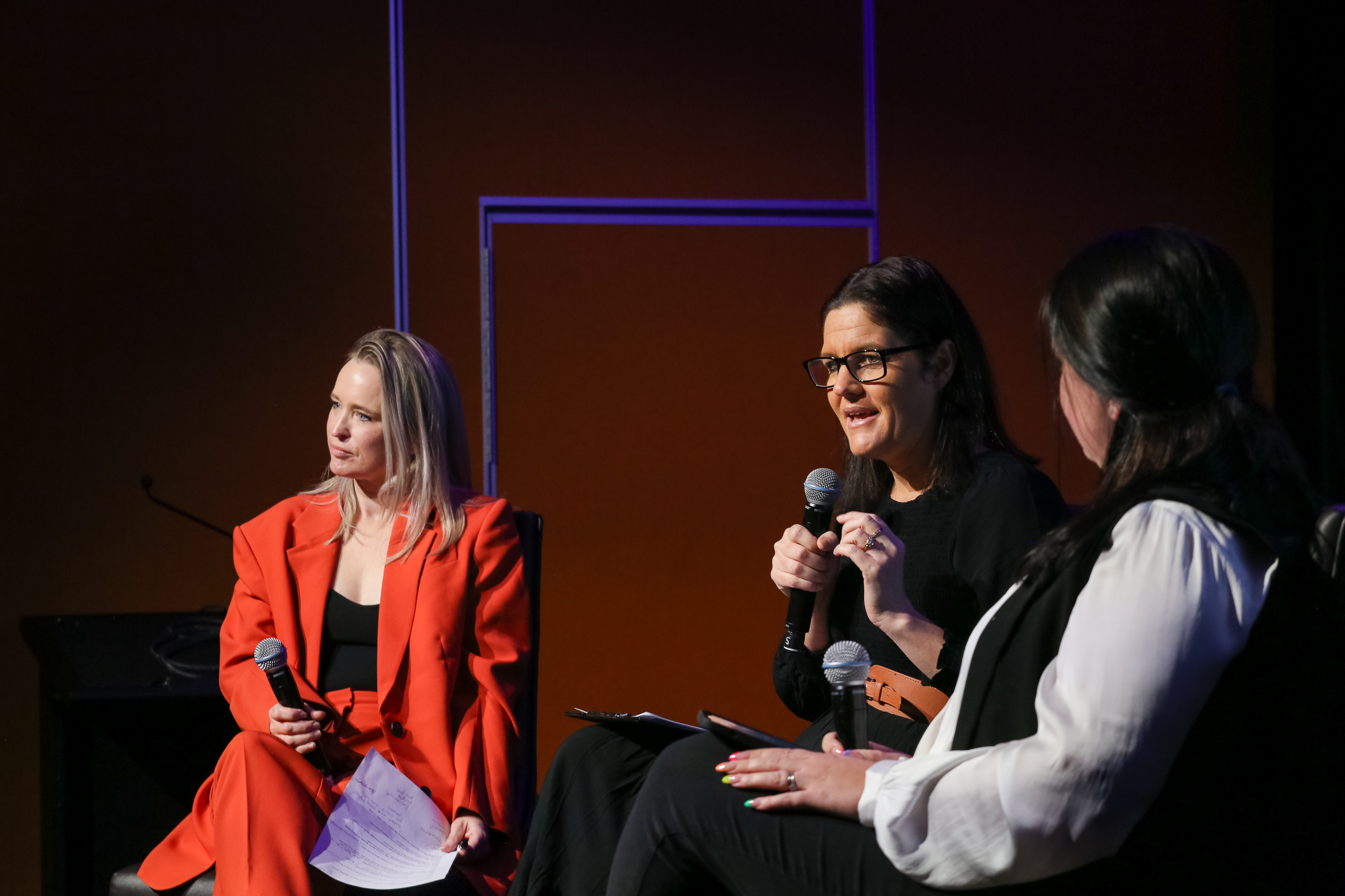 Libbie on a panel at Evolve 2024
